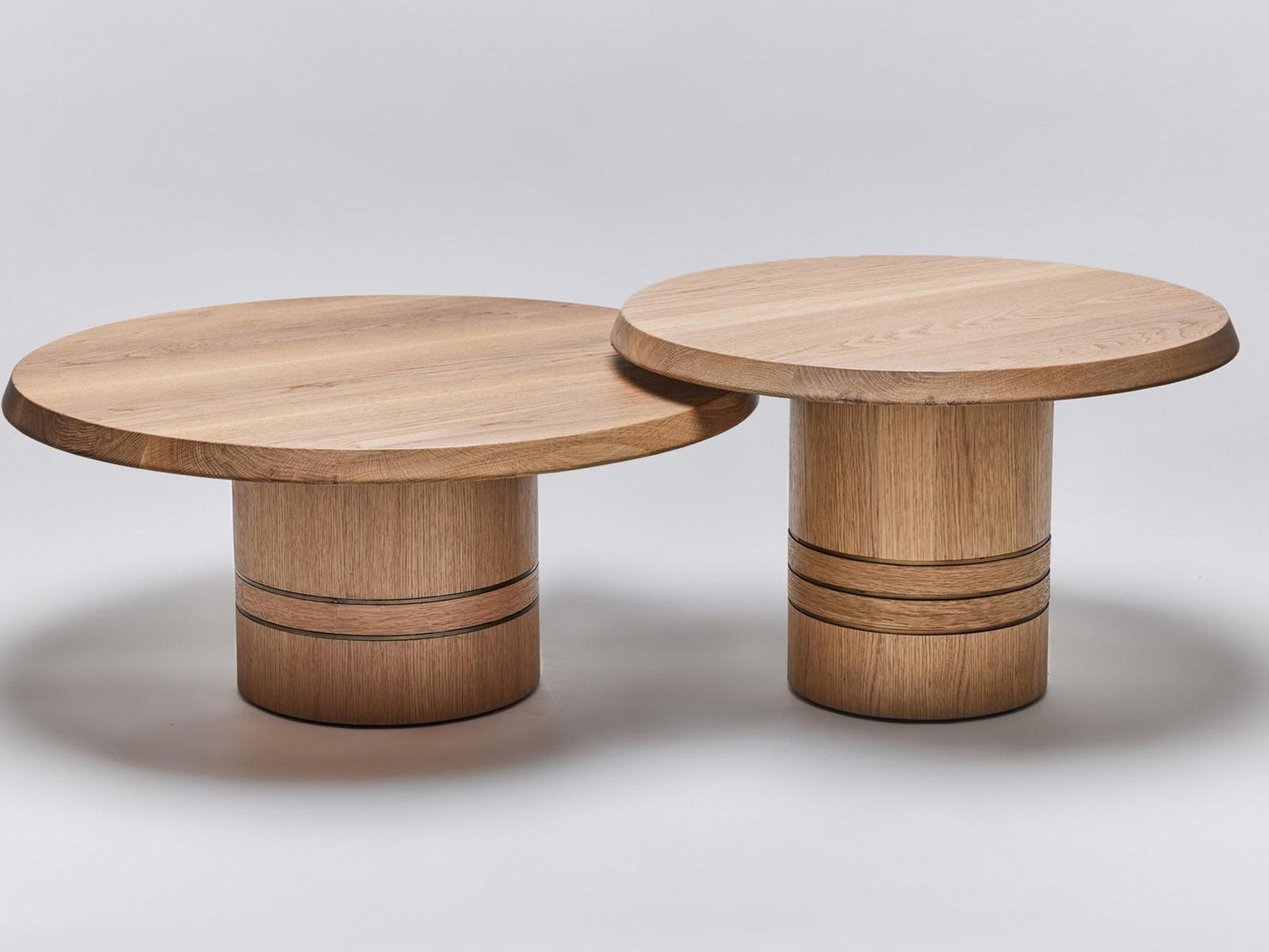 Hunt Bunching Round Oak Coffee Tables in Simply Natural and Classic Bronze