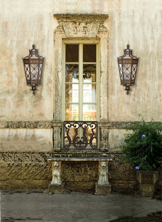 Chateau Outdoor Four-Light Outdoor Wall Sconce with Gold Accents and Antiqued Glass