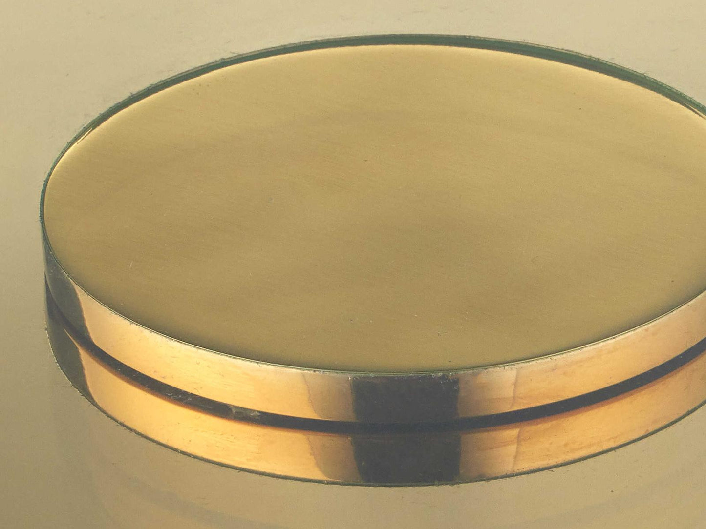 Currey and Company Lemy Round Coffee Table in Polished Brass with Tempered Glass