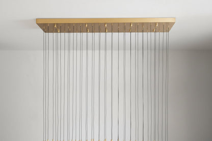 Raindrop Glass Solitaire Linear Chandelier