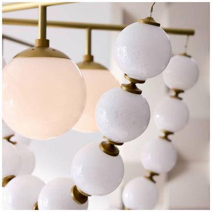 Arteriors Genesis Chandelier 42" Opal Antique Brass