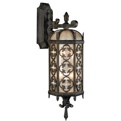 Costa del Sol Three-Light Outdoor Wall Sconce with Quatrefoil Details and Subtle Iridescent Textured Glass Shade